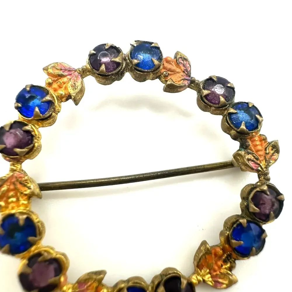 Antique gold tone blue purple Czech glass rhinestones enamel wreath brooch